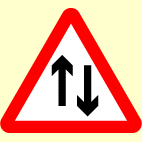 Which sign indicates that there will be two-way traffic crossing your route ahead?